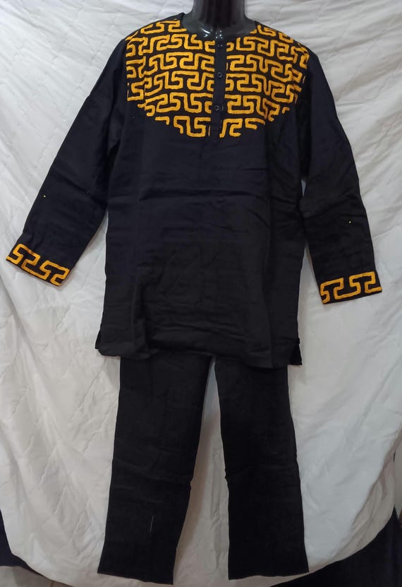 Africa inspired men's 2pc long sleeve top and pants set.  3 button neck top and pockets. Sizes- L to 3XL. Free Shipping and 20% OFF.
