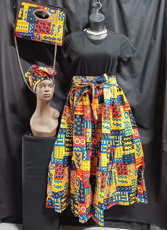 3pc African Print Skirt, black, orange, blue, yellow and red matching purse and headwrap. Maxi length skirt . 100% Cotton. Free Shipping