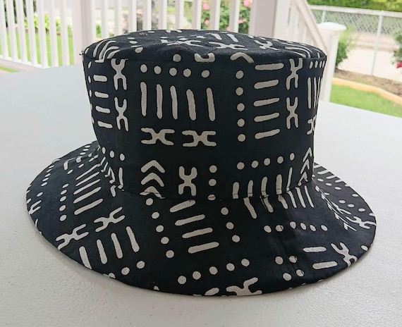 Africa inspired fabric Brim hat. Cotton fabric fully lined. Unisex. Colors are black and white faux mudcloth. 20 %OFF and FREE Shipping.
