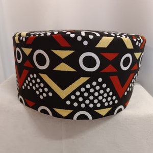 African kufi black, dark reddish brown,  yellow and white print