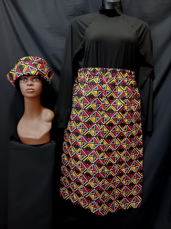 2pc Africa Print Skirt and matching bucket hat. Straight ankle length, elastic waist skirt with pockets. Free Shipping, 20 % OFF.