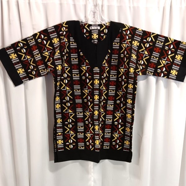 African Dashiki with matching Kufi Black, brown, yellow and White Print trimmed in black, sold as set or separately.