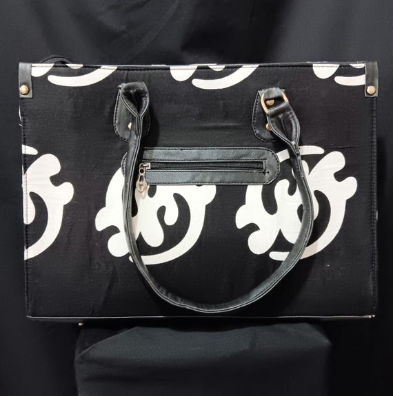 Africa Inspired Tote bag, beautiful African Fabric.  Zipper close top, front zipper pocket, leather hand handle. 20% OFF and FREE Shipping.