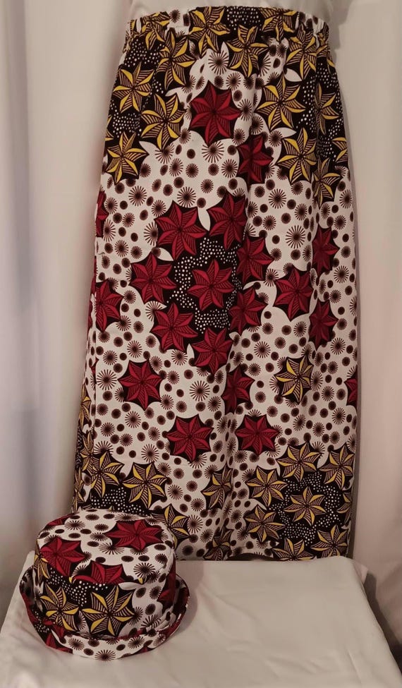 2pc Africa Print Skirt and matching bucket hat. Straight ankle length, elastic waist skirt with pockets. Free Shipping, 20 % OFF.