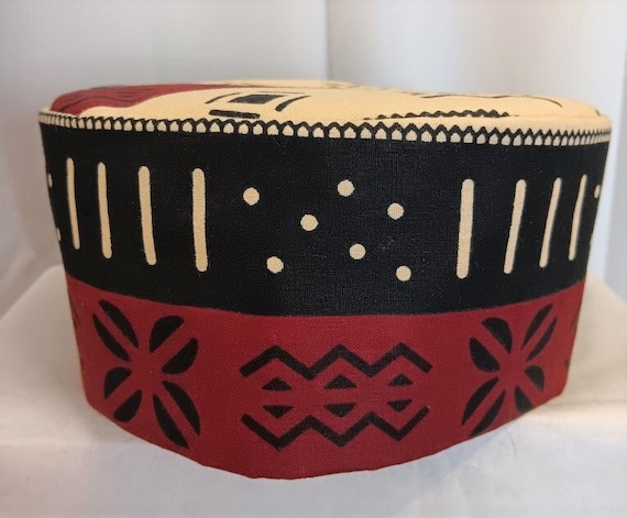 African kufi mud cloth print, black and white brown and beige.