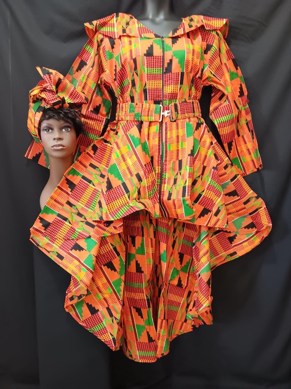 Africa inspired dress. High-low dress with matching Headwrap and cinch belt. Zipper front, long sleeves, pockets. 20% off and Free Shipping.