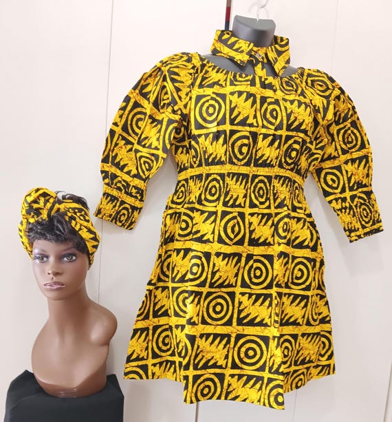 Africa inspired dress ON off shoulder, floating collar, elastic waist, knee length, pocket dress, matching headwrap. 20% OFF, Free shipping.