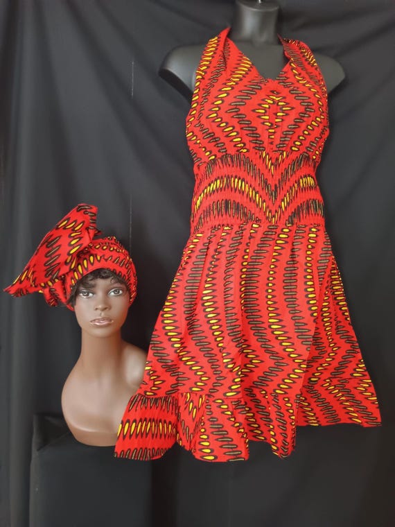 Africa print Sleeveless Halter top dress. Tie back neck, wide elastic waist, pockets, mid length dress with headwrap. 20% OFF. FREE shipping