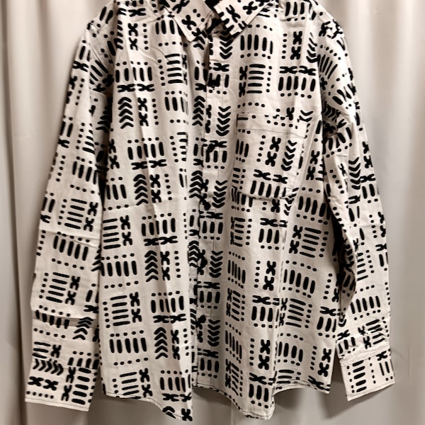 African print white and black men's long sleeve, button down front shirt. Sizes Medium, Large, xl , 2xl, 3xl.