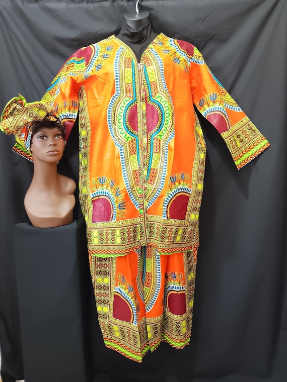 3 PC Africa inspired pants set, Jacket top, long sleeve zipper front, elastic waist pants and matching headwrap. 20% off, Free Shipping.
