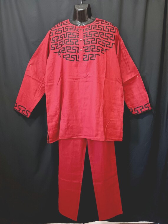 Africa inspired men's 2pc long sleeve top and pants set.  3 button neck top and pockets. Sizes- L to 3XL. Free Shipping and 20% OFF.