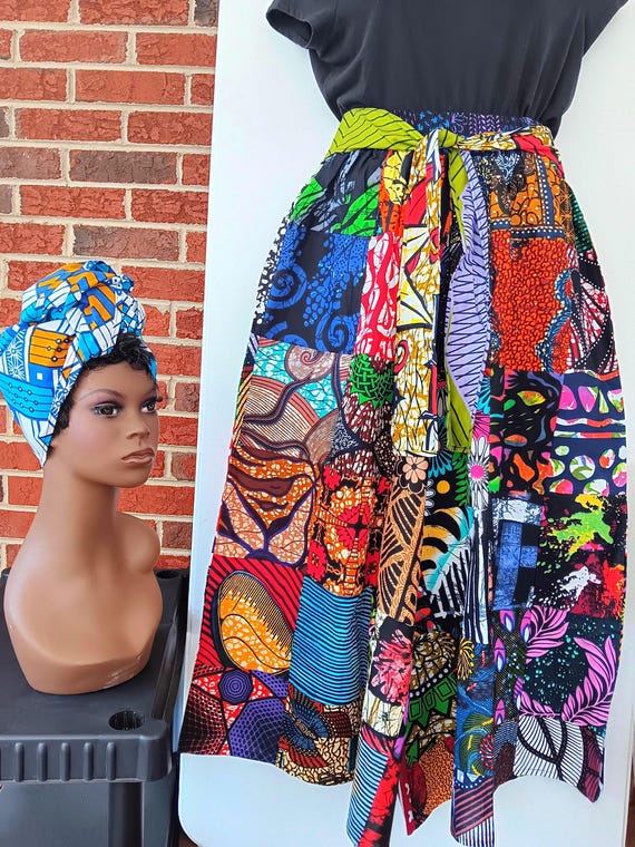African inspired Palazzo Pants. Patchwork African print and colors, tie waist belt, pockets and headwrap. 20% Off and Free Shipping.