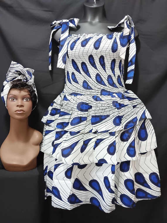 Africa print sun dress with headwrap. Elastic top to waist, tie straps shoulders. Three ruffles waist to bottom. 20% OFF. FREE Shipping.