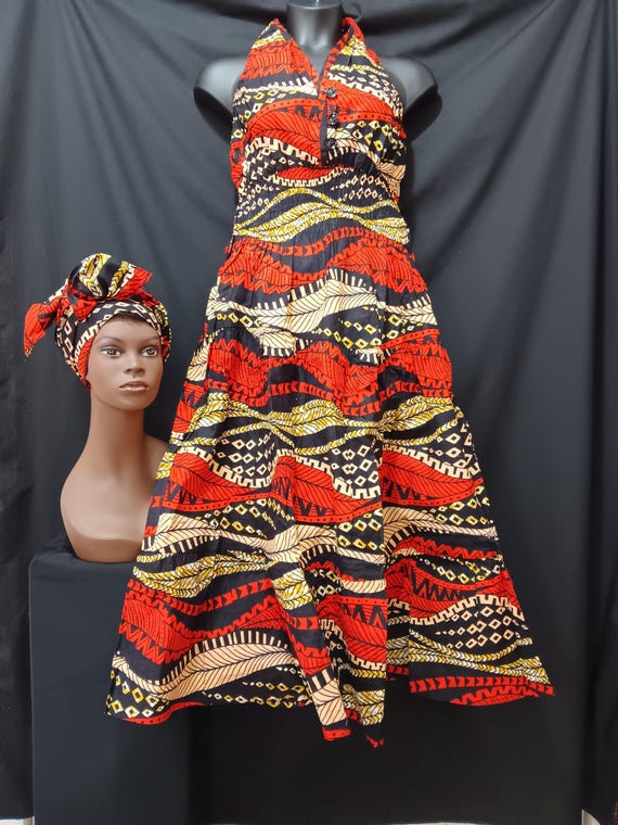 African print Dress and headwrap. Top Sleevess, halter neck, elastic back to waist, 3 button front, ankle length. 20% off and Free Shipping.