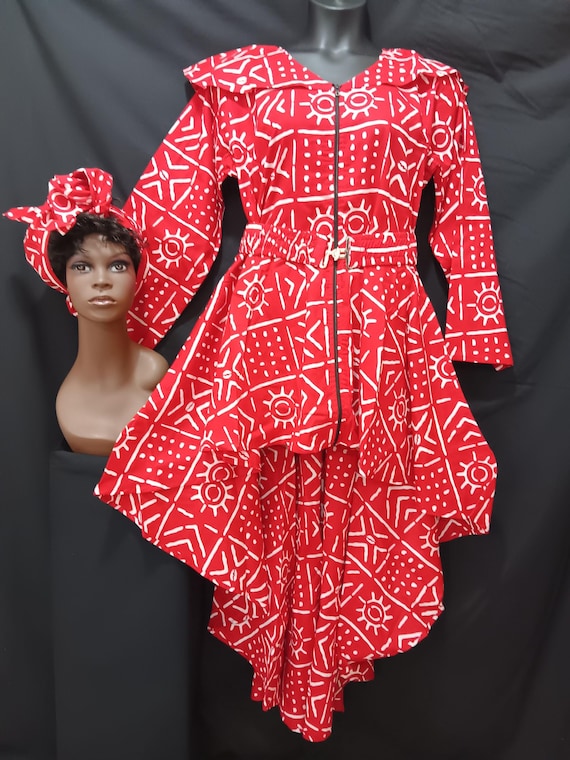 Africa inspired dress. High-low dress with matching Headwrap and cinch belt. Zipper front, long sleeves, pockets. 20% off and Free Shipping.