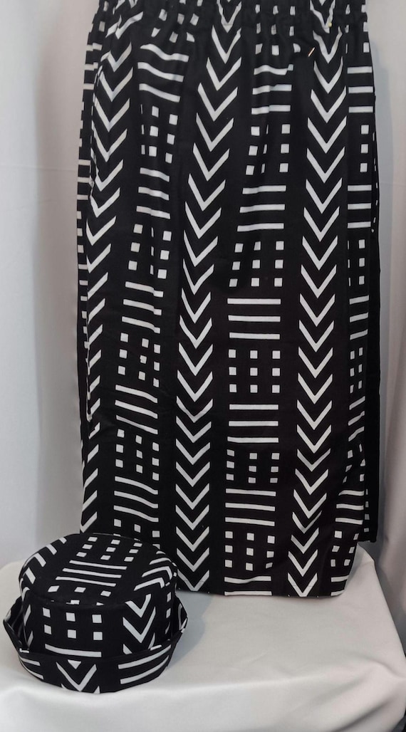 2pc Africa Print Skirt and matching bucket hat. Straight ankle length, and elastic waist skirt with pockets. Free Shipping, 20 % OFF.