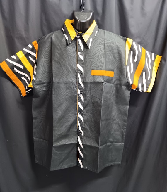 Africa inspired men's short sleeve shirt, button down front. Multi color trim and  black brocade. Large - 44". 20 - 30% off, Free Shipping.