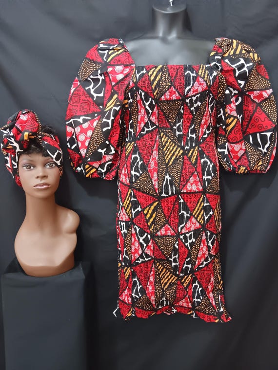 Africa print Dress with matching headwrap. Smocked dress, elastic top to bottom with puffed sleeves. Beautiful! 20% off and Free Shipping.