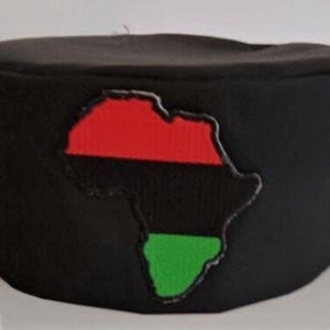 African Kufi Black hat with Map of Africa patch, red, black and green background.
