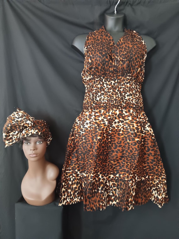 Africa print Sleeveless Halter top dress. Tie back neck, wide elastic waist, pockets, mid length dress with headwrap. 20% OFF. FREE shipping