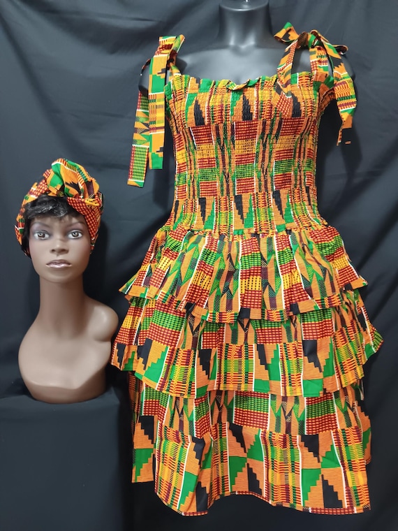 Africa print sun dress with headwrap. Elastic top to waist, tie straps shoulders. Three ruffles waist to bottom. 20% OFF. FREE Shipping.