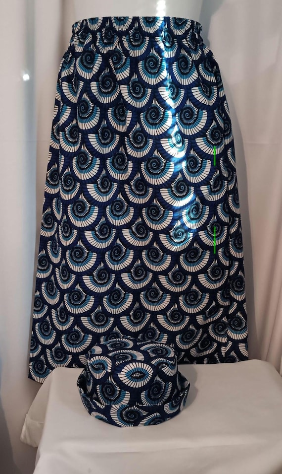 2pc Africa Print Skirt and matching bucket hat. Straight ankle length, and elastic waist skirt with pockets. Free Shipping, 20 % OFF.