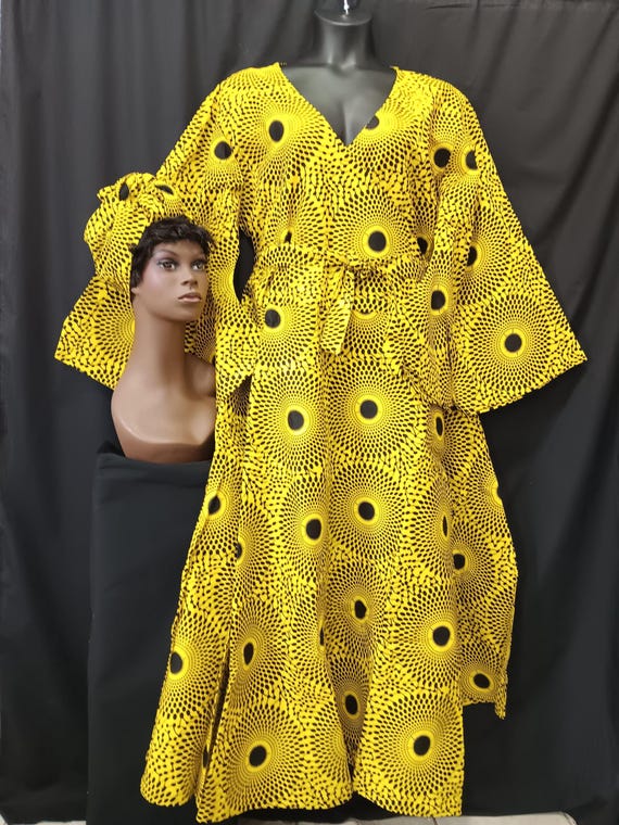 African print Wrap dress with matching headwrap. Beautiful  print. Long full flowing sleeves and pockets. 20% Off, Free Shipping