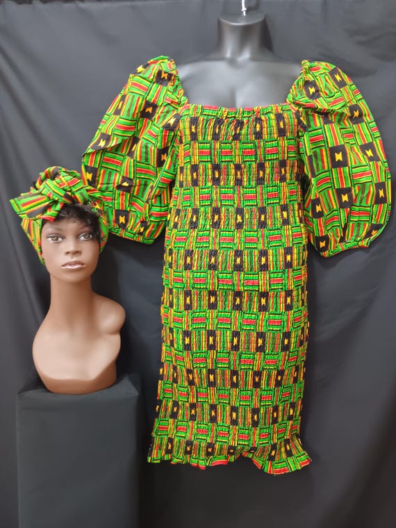 Africa print Dress with matching headwrap. Smocked dress, elastic top to bottom with puffed sleeves. Beautiful! 20% off and Free Shipping.