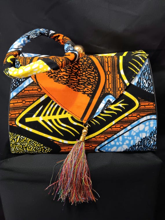 Africa Inspired Purse. Beautiful African Fabric. Snap front, Hand Handle and detachable Body belt strap. 20% OFF and FREE Shipping.