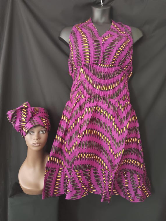 Africa print Sleeveless Halter top dress. Tie back neck, wide elastic waist, pockets, mid length dress with headwrap. 20% OFF. FREE shipping