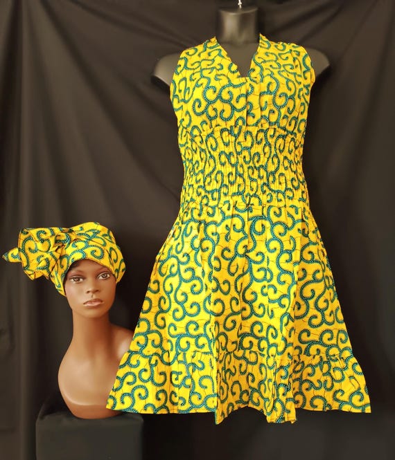 Africa print Sleeveless Halter top dress. Tie back neck, wide elastic waist, pockets, mid length dress with headwrap. 20% OFF. FREE shipping