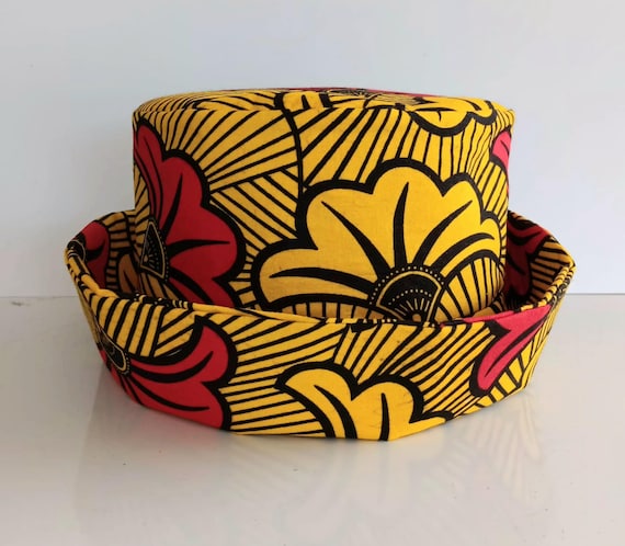 Africa inspired fabric Bucket hat, cotton fabric fully lined. Unisex. Colors are red, yellow, black fabric. 20%OFF and FREE Shipping