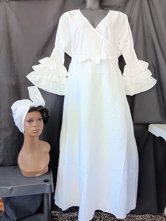 Africa inspired All White wrap dress with matching headwrap. Ankle length, pockets, long sleeves 3 ruffle bottom. 20% off. Free Shipping.