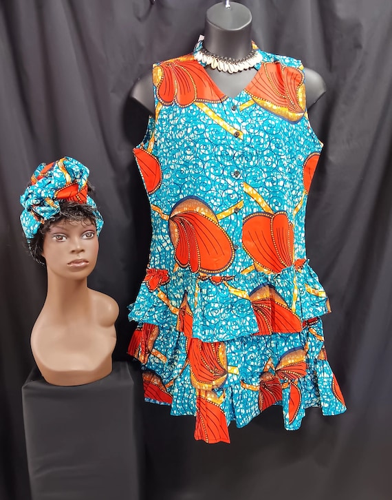 African print Dress, cute Sleeveless with headwrap, button down front to hips. V neck, back stand up collar. 3 ruffle bottom knee length.