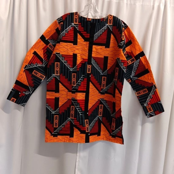 African print men's long sleeve shirt, buttons at neck and sleeve. Bright and vibrant orange and red. SIZES-M, L, XL, XXL, 3XL, 4XL, 5XL