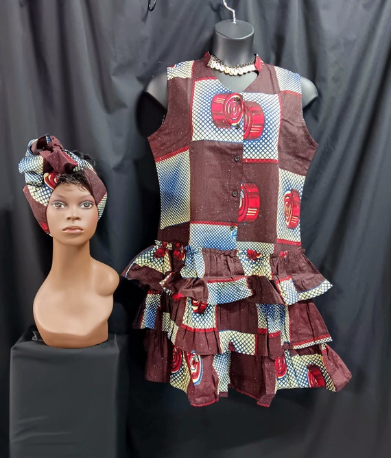 African print Dress, cute Sleeveless with headwrap, button down front to hips. V neck, back stand up collar. 3 ruffle bottom knee length.