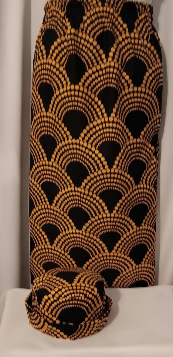 2pc Africa Print Skirt and matching bucket hat. Straight ankle length, and elastic waist skirt with pockets. Free Shipping, 20 % OFF.