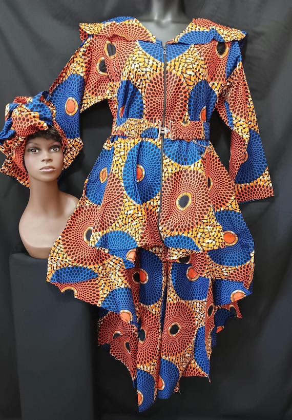 Africa inspired dress. High-low dress with matching Headwrap and cinch belt. Zipper front, long sleeves, pockets. 20% off and Free Shipping.