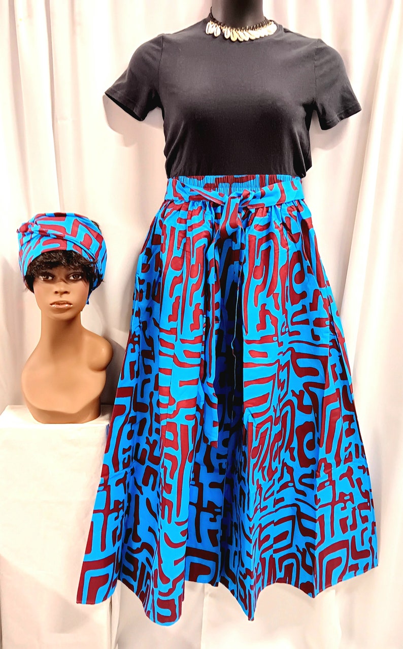 African women's Palazzo Pants. Royal blue, and plum purple African print with, tie waist belt, pockets and headwrap. image 1