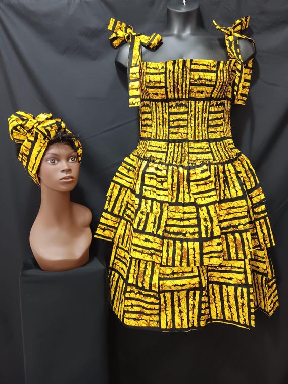 Africa print sun dress with headwrap. Elastic top to waist, tie straps shoulders. Three ruffles waist to bottom. 20% OFF. FREE Shipping.