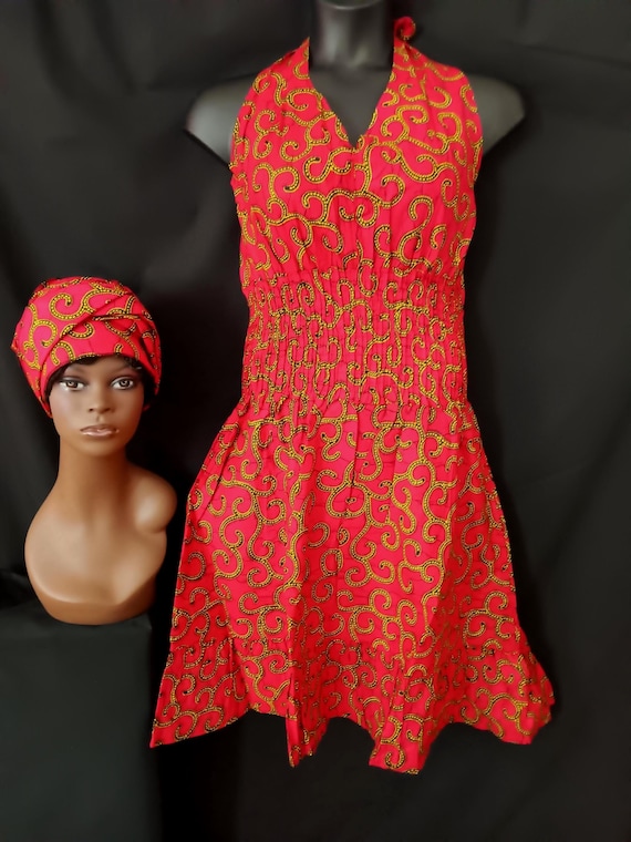Africa print Sleeveless Halter top dress. Tie back neck, wide elastic waist, pockets, mid length dress with headwrap. 20% OFF. FREE shipping