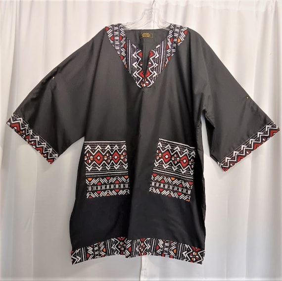 African black dashiki, trimmed in beautiful African print and (Lightweight fabric) matching Kufi sold  separately.