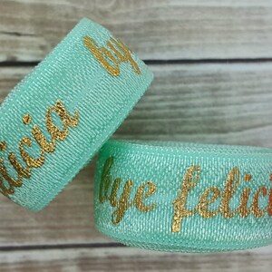 5/8  AQUA   BYE FELICIA Gold Foil Fold Over Elastic