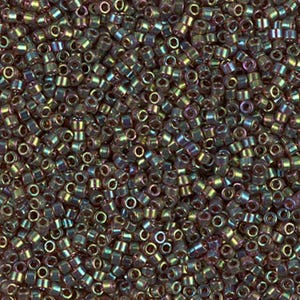 May include: A close-up image of a large quantity of small, round, iridescent glass beads. The beads are a mix of dark green, brown, and gold colors.