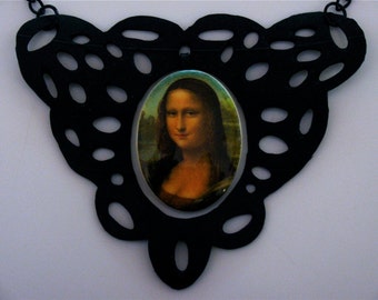 Recycled bike tire Mona Lisa necklace, Upcycled faux leather necklace, Lacey black recycled necklace