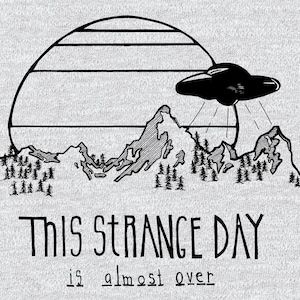 May include: Black and white illustration of a UFO hovering over a mountain range with a retro sunset behind it. The text "This strange day is almost over" is below the image.