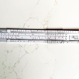 Vintage pocket slide rule / C-Thru small slide rule #27