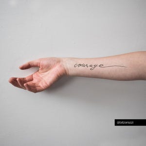 Courage large temporary tattoo script calligraphy cursive flowing text black simple minimal hipster original brave fighter strong