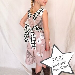 The Una Dress sewing pattern for girls. Sizes 2-9. A customizable two-hour dress with easy, professional results. PDF instant download.