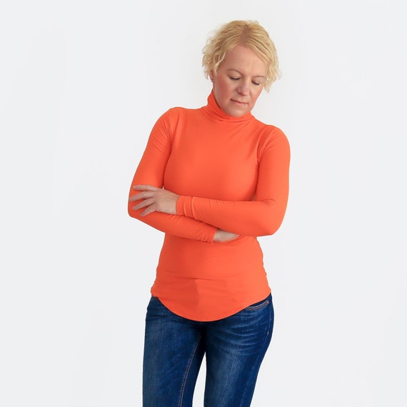orange turtleneck sweater